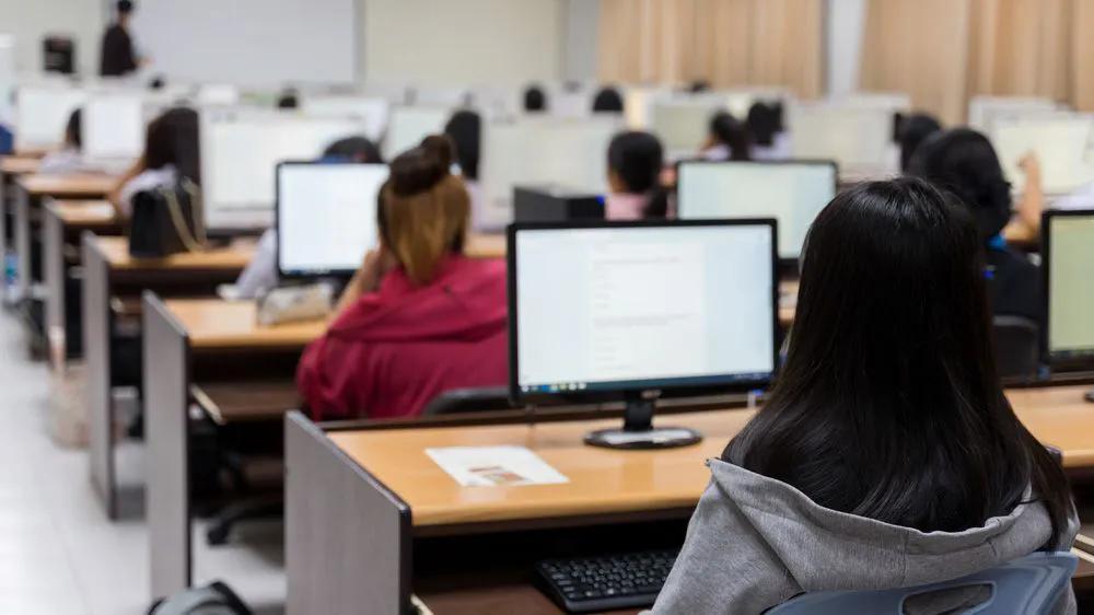 Classroom of students using desktop computers at a Minneapolis charter school supported by LXE Digital’s full-service IT consulting and technology management