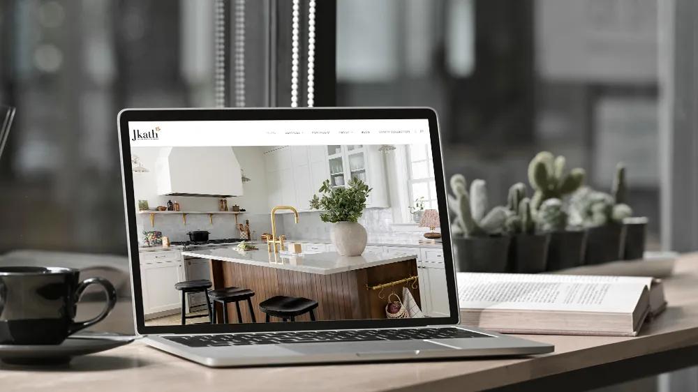 Laptop displaying the custom WordPress e-commerce site LXE Digital built for Jkath, an award-winning interior design firm in Minneapolis